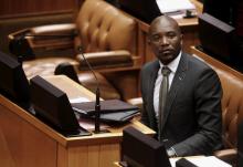 South Africa's opposition Democratic Alliance (DA) leader Mmusi Maimane listens in Parliament in Cape Town during a motion to impeach President Jacob Zuma, April 5, 2016. PHOTO BY REUTERS/Mike Hutchings
