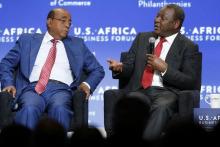 Mo Ibrahim Foundation Founder and Chair Mo Ibrahim (L) and Equity Bank Group CEO James Mwangi participate in a panel discussion on investment during the U.S.-Africa Business Forum in Washington