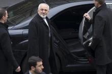 Iran's Foreign Minister Javad Zarif (C) departs his hotel to return to Iran following days of negotiations with United States Secretary of State John Kerry over Iran's nuclear program in Lausanne, Switzerland March 20, 2015. PHOTO BY REUTERS/Brian Snyder