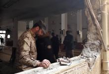 A member of the Libyan National Army inspects the damage following a twin bombing inside a mosque in Benghazi, Libya, February 9, 2018. PHOTO BY REUTERS/Stringer