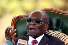 Zimbabwe's former president Robert Mugabe gestures during a news conference at his private residence nicknamed "Blue Roof" in Harare, Zimbabwe, July 29, 2018. PHOTO BY REUTERS/Siphiwe Sibeko