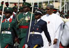 Nigeria's President Muhammadu Buhari inspects the guard of honour during the 2018 Armed Forces Remembrance Day celebration in Abuja, Nigeria, January 15, 2018. PHOTO BY REUTERS/Afolabi Sotunde