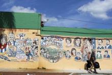 Cuban-themed murals adorn the buildings along SW 8th Street, known locally as "Calle Ocho" in the Little Havana neighborhood of Miami, Florida May 17, 2014. PHOTO BY REUTERS/Brian Blanco