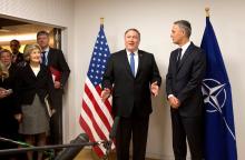U.S. Secretary of State Mike Pompeo and NATO Secretary General Jens Stoltenberg attend a NATO foreign ministers meeting at the Alliance's headquarters in Brussels, Belgium, April 27, 2018. PHOT BY REUTERS/ Virginia Mayo