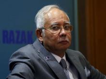 Malaysia's Prime Minister Najib Razak attends a presentation for government interns at the Prime Minster's office in Putrajaya, Malaysia, July 8, 2015. PHOTO BY REUTERS/Olivia Harris