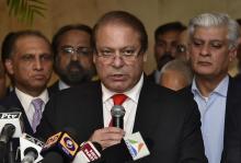 Pakistan's Prime Minister Nawaz Sharif speaks with the media during a new conference in New Delhi