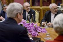 (From left) Iranian Deputy Foreign Minister Abbas Araghchi, US Secretary of State John Kerry, Head of Iranian Atomic Energy Organisation Ali Akbar Salehi, Iranian Foreign Minister Javad Zarif and US Under Secretary for Political Affairs Wendy Sherman wait for a meeting at the Beau Rivage Palace Hotel, March 27, 2015. PHOTO BY REUTERS/Brendan Smialowski