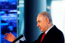 Israeli Prime Minister Benjamin Netanyahu speaks during the dedication ceremony of a new concourse at the Ben Gurion International Airport, near Lod, Israel, February 15, 2018. PHOTO BY REUTERS/Ronen Zvulun