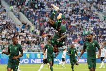 Nigeria's Victor Moses celebrates scoring their first goal. PHOTO BY REUTERS/Toru Hanai