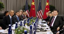 U.S. President Barack Obama (L) meets with Chinese President Xi Jinping (R) at the Nuclear Security Summit in Washington, March 31, 2016. PHOTO BY REUTERS/Kevin Lamarque