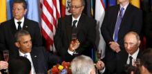 Russian President Vladimir Putin and U.S. President Barack Obama share a toast during the luncheon at the United Nations General Assembly in New York, September 28, 2015. PHOTO BY REUTERS/Kevin Lamarque