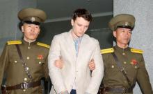 Otto Frederick Warmbier (C), a University of Virginia student who was detained in North Korea since early January, is taken to North Korea's top court in Pyongyang, North Korea, in this photo released by Kyodo, March 16, 2016. PHOTO BY REUTERS/Kyodo