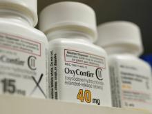 Bottles of prescription painkiller OxyContin, 40mg pills, made by Purdue Pharma L.D. sit on a shelf at a local pharmacy, in Provo, Utah, U.S., April 25, 2017. PHOTO BY REUTERS/George Frey