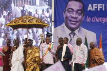 Pascal Affi N'Guessan of the Ivorian Popular Front (FPI) party poses for pictures with chiefs after a ceremony for his official inauguration as a presidential candidate for Ivory Coast's upcoming presidential election, at the Culture Palace of Abidjan in Treichville, August 8, 2015. PHOTO BY REUTERS/Thierry Gouegnon