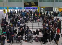 Passengers wait around in the South Terminal building at Gatwick Airport after drones flying illegally over the airfield forced the closure of the airport, in Gatwick, Britain, December 20, 2018. PHOTO BY REUTERS/Peter Nicholls
