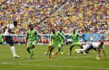 France's Paul Pogba (L) scores a goal during their 2014 World Cup round of 16 game against Nigeria at the Brasilia national stadium in Brasilia, June 30, 2014. PHOTO BY REUTERS/Siphiwe Sibeko