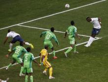 France's Paul Pogba (19) heads to score a goal against Nigeria during their 2014 World Cup round of 16 game at the Brasilia national stadium in Brasilia, June 30, 2014. PHOTO BY REUTERS/David Gray