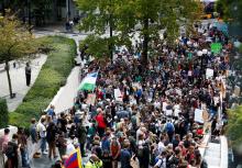 People gather at Seattle City Hall during a Climate Strike march in Seattle, Washington, U.S., September 20, 2019. PHOTO BY REUTERS/Lindsey Wasson