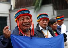 Peruvian indigenous people opposing an approved plan for oil drilling in PeruÕs Amazon, speak with the media during a protest in front of the offices of Geopark Ltd in Santiago, Chile, June 27, 2019. PHOTO BY REUTERS/Rodrigo Garrido