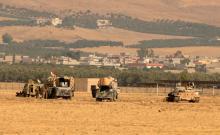 Kurdish peshmerga military vehicles are seen as they clear Fadiliya village in Nawaran, north of Mosul, as part of their offensive to drive Islamic State from Mosul, Iraq, October 26, 2016. PHOTO BY REUTERS/Ahmed Jadallah