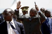 Burundi's President Pierre Nkurunziza waves to his supporters as he arrives for the promulgation of the new constitution at Bugendana commune in Gitega Province, Burundi, June 7, 2018. PHOTO BY REUTERS/Evrard Ngendakumana