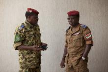 Burkina Faso's Army chief of staff General Pingrenoma Zagre (R) speaks to a member of the presidential guard in Ouagadougou, Burkina Faso, September 18, 2015. PHOTO BY REUTERS/Joe Penney
