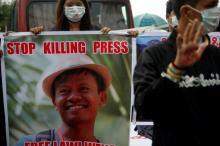 Reporters protest as they call on Myanmar government and military authorities to release reporters who were arrested in Yangon, Myanmar, June 30, 2017. PHOTO BY REUTERS/Soe Zeya Tun