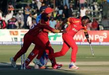 Zimbabwe players celebrate after their T20 cricket victory against India. PHOTO BY REUTERS/Philimon Bulawayo