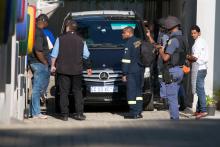 Police raid the home of the Gupta family, friends of President Jacob Zuma, in Johannesburg, South Africa, February 14, 2018. PHOTO BY REUTERS/James Oatway