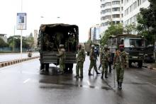Kenyan police guard a street after dispersing a crowd consisting of opposition leaders and their supporters after they tried to enter the premises of the the office of the country's electoral commission to demand its disbandment ahead of next year's election in Nairobi, Kenya, April 25, 2016. PHOTO BY REUTERS/Siegfried Modola
