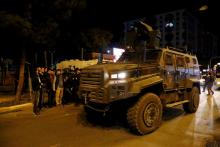 An armored police vehicle is parked in front of the Metropolitan Municipality headquarters in the Kurdish-dominated southeastern city of Diyarbakir, Turkey, October 25, 2016. PHOTO BY REUTERS/Sertac Kayar