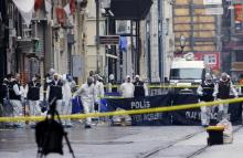 Police forensic experts inspect the area after a suicide bombing in a major shopping and tourist district in central Istanbul, Turkey, March 19, 2016. PHOTO BY REUTERS/Huseyin Aldemir