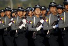Policewomen march during the Grand Military Review Parade ceremony to mark the 67th Independence Day in Naypyitaw, Myanmar, in this January 4, 2015 file photo. PHOTO BY REUTERS/Soe Zeya Tun