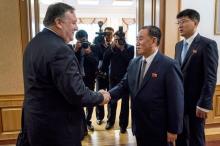 Secretary of State Mike Pompeo meets with Kim Yong Chol, second from right, a North Korean senior ruling party official and former intelligence chief, for a second day of talks at the Park Hwa Guest House in Pyongyang, North Korea, Saturday, July 7, 2018. PHOTO BY REUTERS/Andrew Harnik