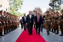 U.S. Secretary of State Mike Pompeo is greeted by Chief of Staff Abdul Salam Rahimi, as he arrives at Gul Khanna in the Presidential Palace in Kabul, Afghanistan, Monday, July 9, 2018. PHOTO BY REUTERS/Andrew Harnik