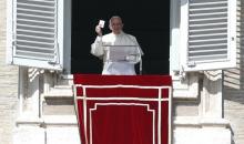 Pope Francis holds a box containing a rosary and called "Misericordina" during his Angelus prayer in Saint Peter's square at the Vatican, February 21, 2016. PHOTO BY REUTERS/Tony Gentile