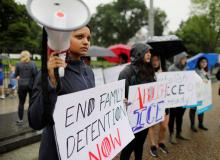 Demonstrator Sara Mathews plays a recording of the cries of illegal immigrant children held in a U.S. detention facility after being separated from their parents during a protest against the separation of immigrant families outside the White House in Washington, U.S., June 22, 2018. PHOTOT BY REUTERS/Jim Bourg