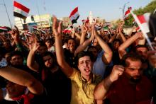 People protest over poor public services in the city of Najaf, Iraq, July 27, 2018. PHOTO BY REUTERS/Alaa al-Marjani