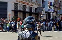 A riot policeman prepares to disperse opposition demonstrators protesting against new electoral laws in Antananarivo, Madagascar, April 21, 2018. PHOTO BY REUTERS/Clarel Faniry Rasoanaivo