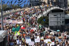 Climate change protesters are seen crossing the Victoria Bridge during the Global Strike 4 Climate rally in Brisbane, Australia, September 20, 2019. PHOTO BY REUTERS/AAP Image/Darren England