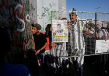 Palestinians take part in a protest in support of Palestinian prisoners on hunger strike in Israeli jails, in the West Bank city of Bethlehem, May 4, 2017. PHOTO BY REUTERS/Mussa Qawasma