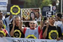 Protesters take part in a demonstration called by Amnesty International on the International Day in Support of Victims of Torture, in Rabat, Morocco, June 26, 2015. PHOTO BY REUTERS/Stringer