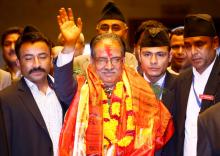 Nepal's newly elected Prime Minister Pushpa Kamal Dahal, also known as Prachanda, waves towards the media after he was elected Nepal's 24th prime minister in 26 years, in Kathmandu, Nepal, August 3, 2016. PHOTO BY REUTERS/Navesh Chitrakar