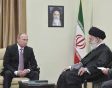 Russia's President Vladimir Putin (L), who arrived to attend the Gas Exporting Countries Forum (GECF), meets with Iran's Supreme Leader Ayatollah Ali Khamenei in Tehran, Iran, November 23, 2015. PHOTO BY REUTERA/Alexei Druzhinin