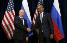 U.S. President Barack Obama shakes hands with Russian President Vladimir Putin during their meeting at the United Nations General Assembly in New York, September 28, 2015. PHOTO BY REUTERS/Kevin Lamarque
