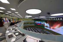 Russia's President Vladimir Putin (5th L) visits the National Defence Control Centre (NDCC) to oversee the test of a new Russian hypersonic missile system called Avangard, which can carry nuclear and conventional warheads, in Moscow, Russia, December 26, 2018. PHOTO BY REUTERS/Sputnik/Mikhail Klimentyev/Kremlin