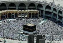 Muslim pilgrims attend Friday prayer at the Grand mosque ahead of annual Haj pilgrimage in the holy city of Mecca, Saudi Arabia, August 17, 2018. PHOTO BY REUTERS/Zohra Bensemra