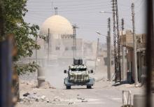 A military vehicle of SDF in west of Raqqa province, Syria June 18, 2017. PHOTO BY REUTERS/ Rodi Said