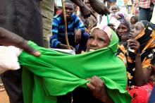A newly arrived Somali refugee is forced out of the queue outside a reception centre in the Ifo 2 refugee camp in Dadaab, near the Kenya-Somalia border, in Garissa County, Kenya, July 28, 2011. PHOTO BY REUTERS/Thomas Mukoya