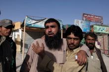 Relatives of police cadets wait for word outside the Police Training Center after an attack on the center in Quetta, Pakistan, October 25, 2016. PHOTO BY REUTERS/Naseer Ahmed